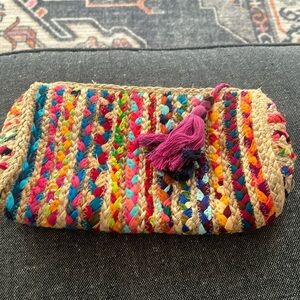 Jute woven ribbon top zip clutch.   Handmade from recycled materials.